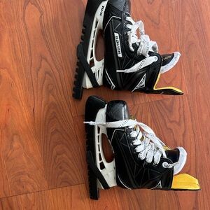 Bauer Black and White Skates with Gold Accents